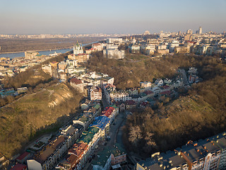 Image showing A view from the height of Vozdvizhenka with new residential houses, Bald mountain and St. Andrew\'s Church in the Kyiv city