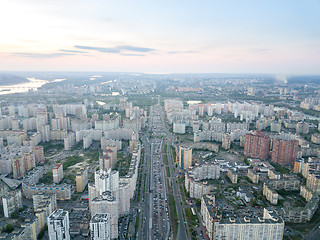 Image showing A bird\'s eye view, aerial panoramic view from drone to the Darnyts\'kyi district of Kiev, Ukraine and view to the right bank of Dnieper at sunset in the summer.