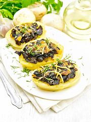 Image showing Potatoes stuffed with mushrooms on table