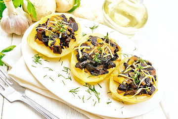 Image showing Potatoes stuffed with mushrooms on board