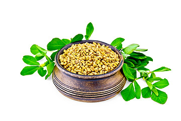 Image showing Fenugreek with green leaves in clay bowl
