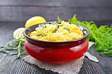 Image showing Gnocchi pumpkin with lemon in bowl on wooden table