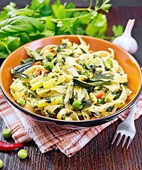 Image showing Tagliatelle with green vegetables on towel