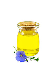 Image showing Oil linenseed in jar with flower