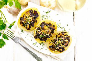 Image showing Potatoes stuffed with mushrooms on board top