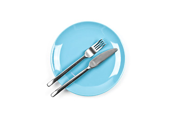 Image showing Set of empty blue plate, fork and knife on white background.