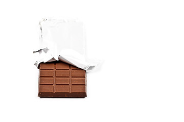 Image showing Chocolate bar in foil isolated on white background.