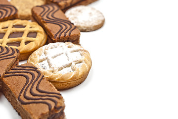 Image showing Cake bars filled with cream, oat cookies and tarts with dark cho