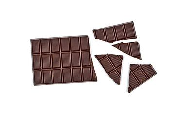 Image showing Broken dark chocolate bar isolated on white.