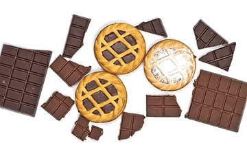 Image showing Tarts with chocolate cream and cracked chocolate pieces isolated