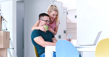 Image showing Young couple moving in a new home