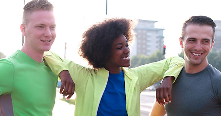 Image showing Portrait of multiethnic group of young people on the jogging