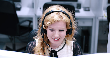 Image showing female call centre operator doing her job