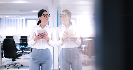 Image showing Business Woman Using Digital Tablet in front of Office