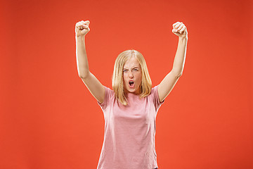 Image showing Winning success woman happy ecstatic celebrating being a winner. Dynamic energetic image of female model