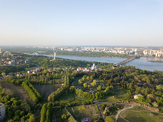 Image showing A bird\'s eye view, panoramic view from the drone to the Botanical Garden, Monument to the Motherland, Dnieper River, Paton Bridge in the city of Kiev, Ukraine