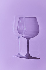 Image showing Wineglass isolated on purple background