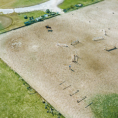 Image showing Aerial view part of the racecourse in Kiev with a horse and people. Photo from the drone