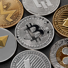 Image showing Different coins of crypto currency on a black background. Business concept.