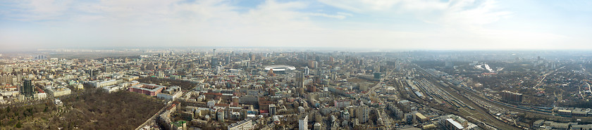 Image showing Panoramic photo of the city of Kiev with the stadium Olympic against the blue sky.