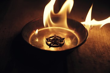 Image showing Old pentagram burning in flames