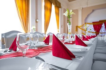 Image showing Large dining hall with tables set up