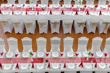 Image showing Large dining hall with tables set up