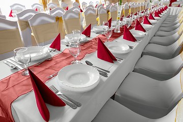 Image showing Large dining hall with tables set up