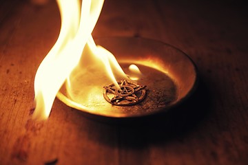 Image showing Old pentagram burning in flames