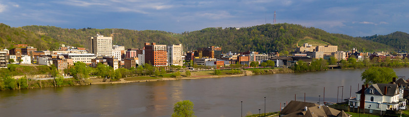 Image showing The Ohio River Meanders by Reflecting Buildings of Wheeling West