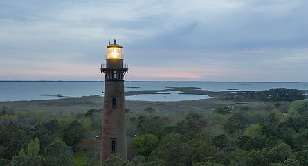 Image showing Sun Setting at Currituck Lighthouse Outer Banks North Carolina