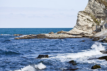 Image showing Blue sea water, stones and rocks on Adriatic sea coast.