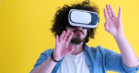 Image showing happy man using VR headset glasses of virtual reality