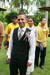 Image showing SAMUI - AUGUST 1: Groom surrounded by traditional Thai dancers p