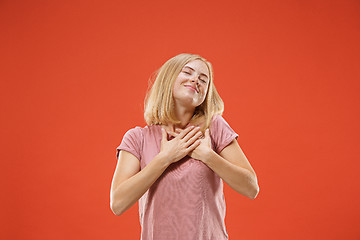 Image showing happy woman. image of female model on red