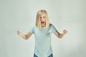 Image showing A portrait of surprised screaming woman