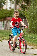 Image showing Happy boy ride the bicycle