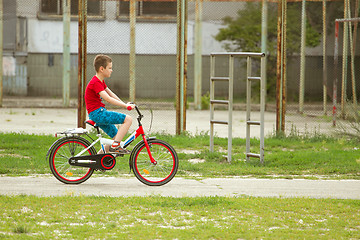 Image showing Happy boy ride the bicycle