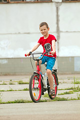 Image showing Happy boy ride the bicycle