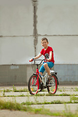 Image showing Happy boy ride the bicycle