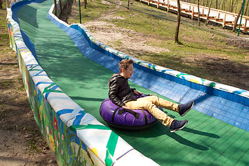 Image showing Happy boy with tube