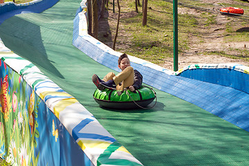 Image showing Happy boy with tube