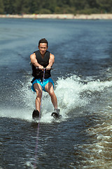 Image showing Man riding water skis