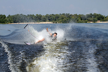 Image showing Man riding water skis