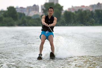 Image showing Man riding water skis