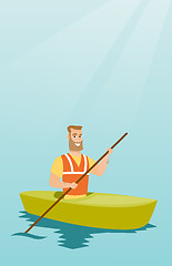 Image showing Young caucasian man travelling by kayak.