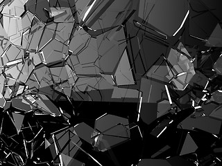 Image showing Pieces of glass shattered or cracked on black