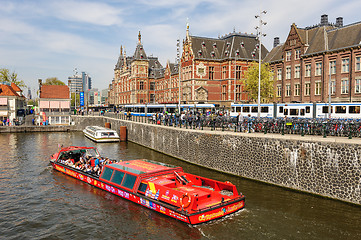 Image showing Sightseeng at Canal Boat City Hopper near the Central Station of Amsterdam