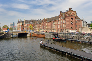 Image showing Sightseeng at Canal Boat City Hopper near the Central Station of Amsterdam