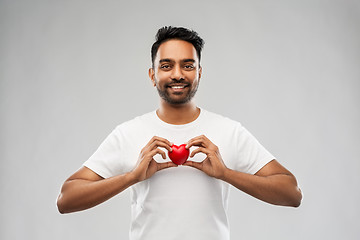Image showing indian man with red heart over grey background